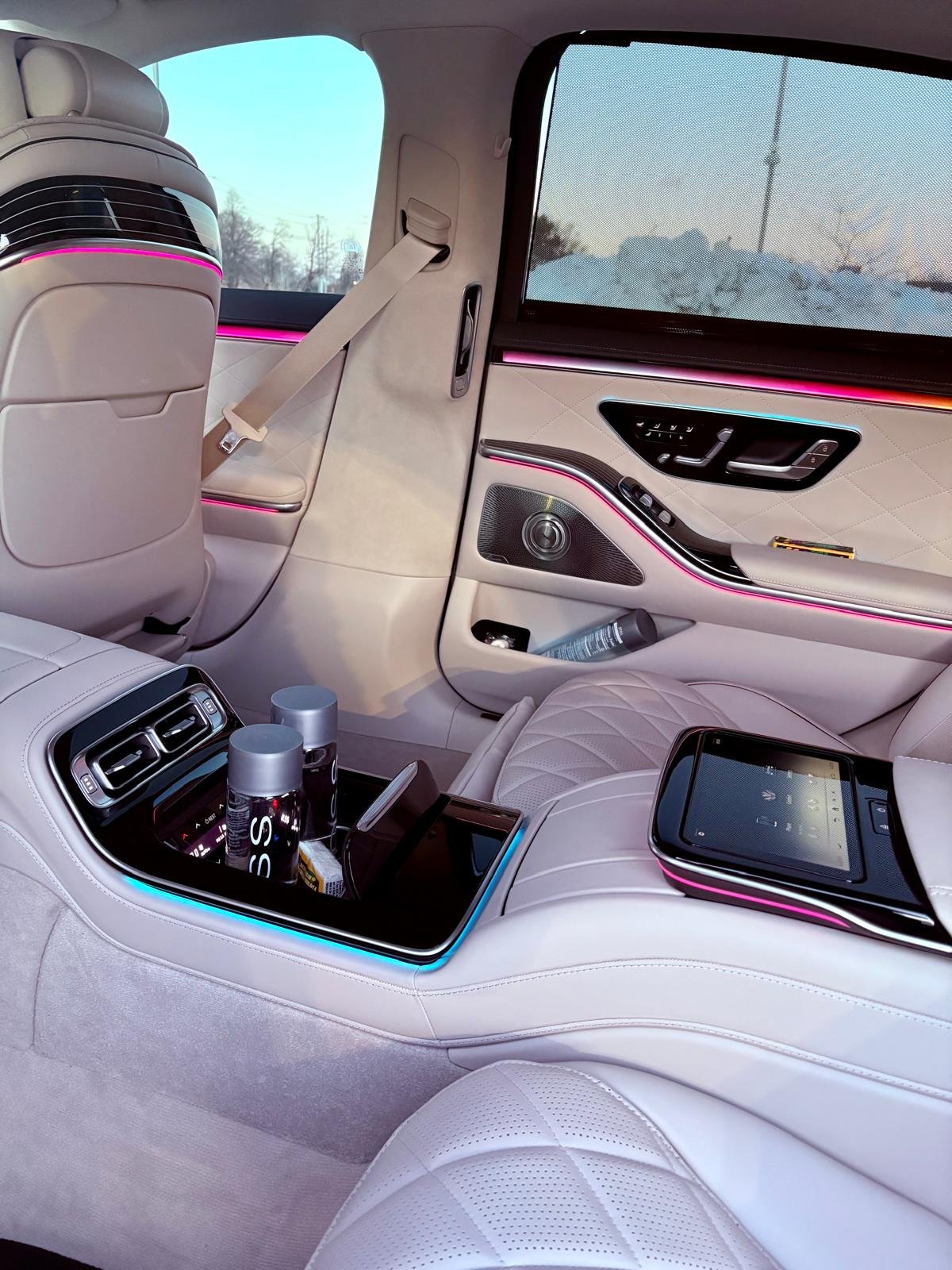 Interior view of a first-class luxury sedan with chauffeur