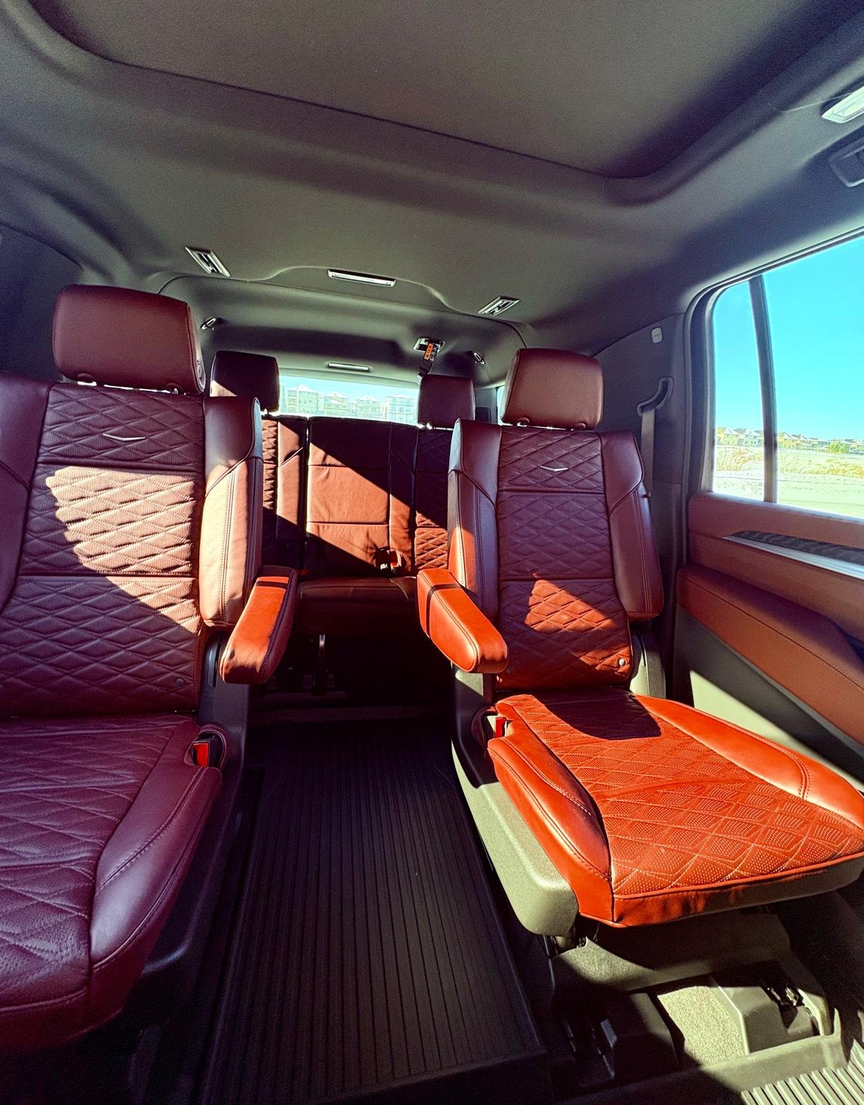 Upscale luxury SUV limo interior with executive seating